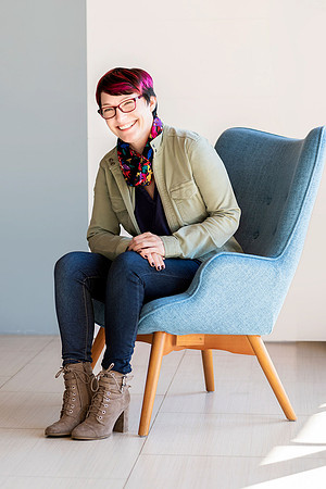 consultant-seated-in-blue-chair-los-angeles