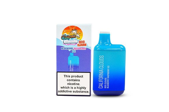 White-background product photograph of a California Clouds blue disposable vape with its retail box and nicotine warning.