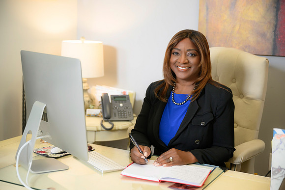 executive-woman-at-office-desk-los-angeles