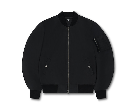 Apparel product photograph of a plain black bomber jacket shown from the front on white.