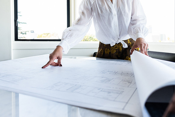 hands-reviewing-architectural-plans-los-angeles