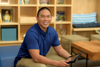 man-holding-tablet-in-workplace-los-angeles