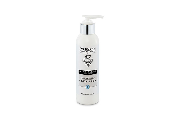 White-background product photograph of an Acne Clear System antimicrobial cleanser pump bottle.